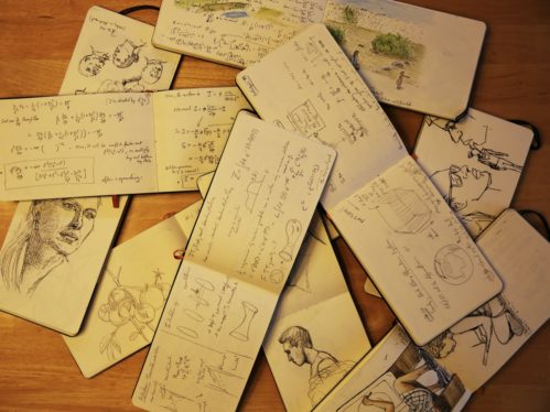 A montage of notebooks