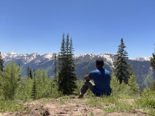 cvj sitting with mountain view